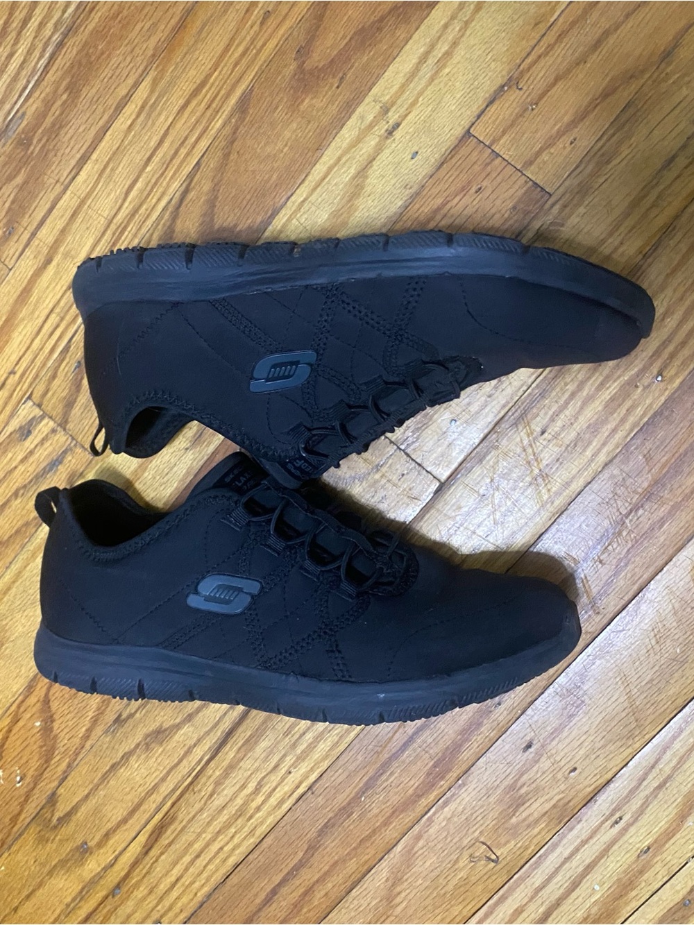 Skechers Women's All-Black Lightweight Slip-On Sneakers